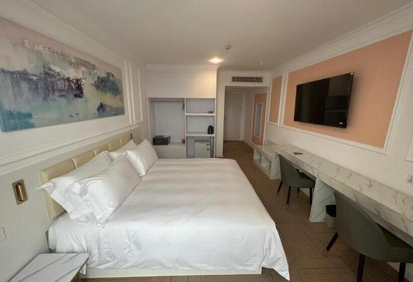 Quarto Deluxe, Magnificent International