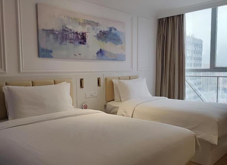 Quarto Familiar Deluxe, Magnificent International