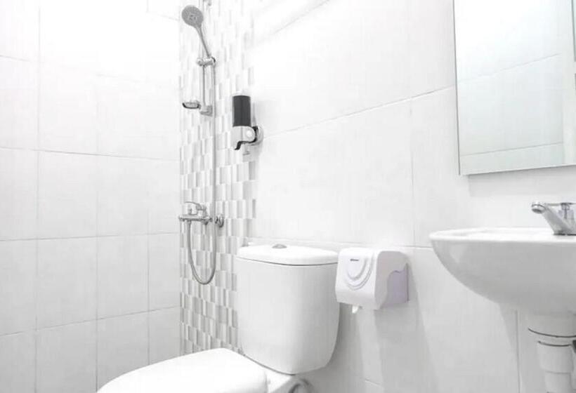 Номер Economy, De Malang Sweet Homestay Syariah Mitra Reddoorz