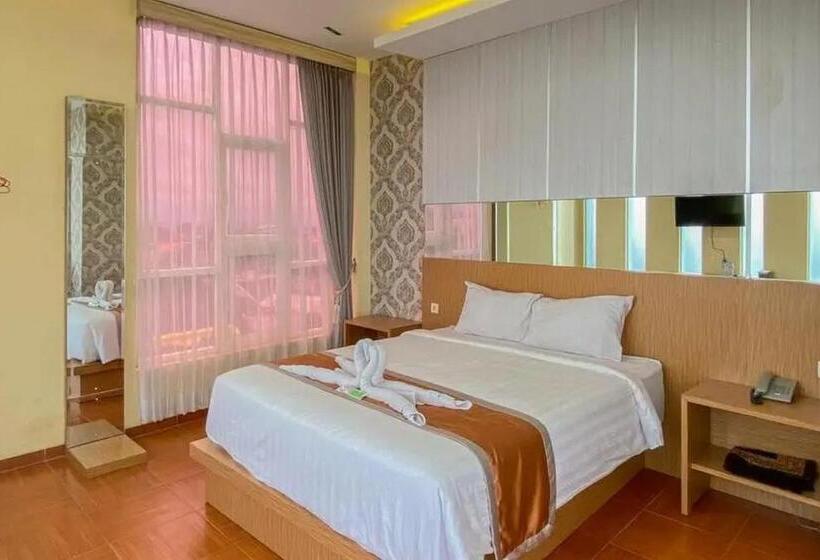 Номер Deluxe, De Malang Sweet Homestay Syariah Mitra Reddoorz