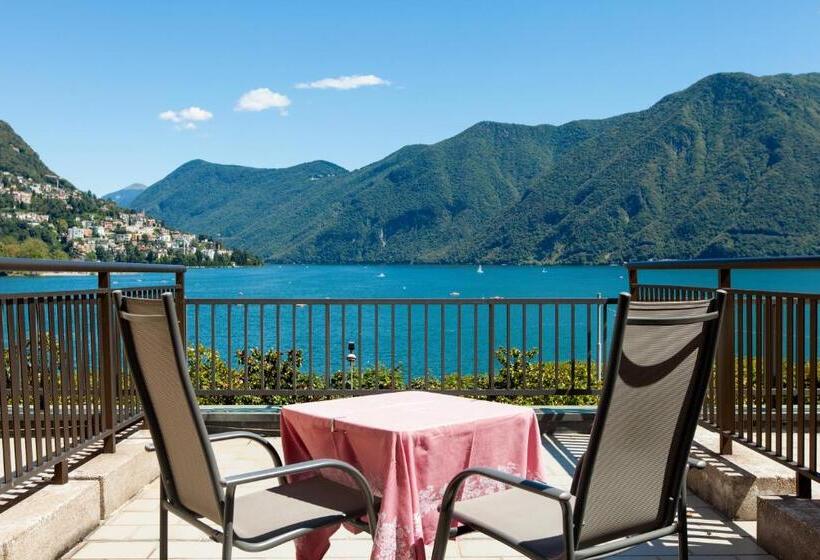 Superior room with lake view, Swiss Lodge Nassa Garni