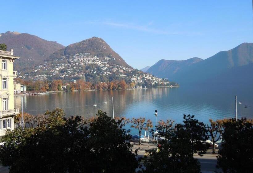 Superior room with lake view, Swiss Lodge Nassa Garni