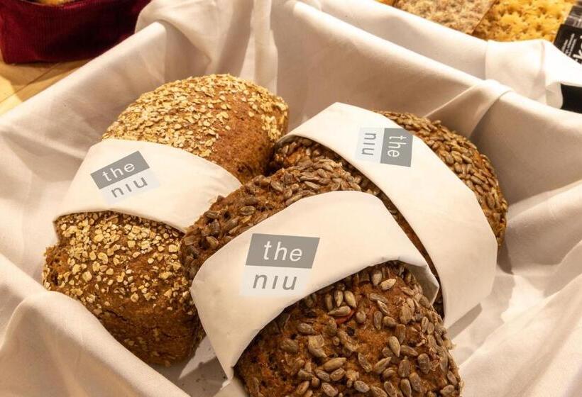 شقة غرفة واحدة, The Niu Belt Apartments