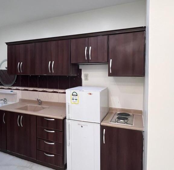 סוויטת ג'וניור משפחתית, شقق أمواج للشقق المخدومة