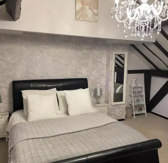 Deluxe-sviitti, Coach House