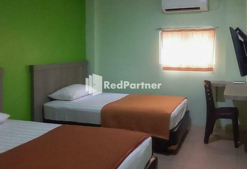 Номер Deluxe, Guest House Anak Raja Pangkalan Bun Syariah Mitra Reddoorz