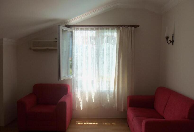 غرفة عائلية, Cam