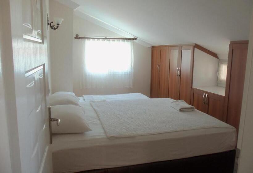 غرفة عائلية, Cam