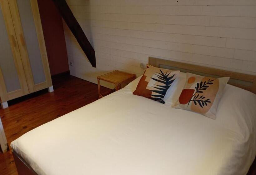 חדר לארבעה סטנדרטי עם נוף לגינה, Les Gîtes Du Petit Marcel