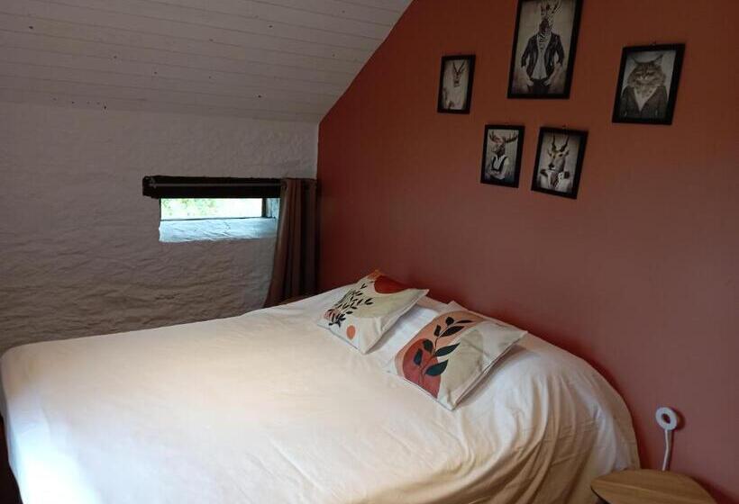 חדר לארבעה סטנדרטי עם נוף לגינה, Les Gîtes Du Petit Marcel