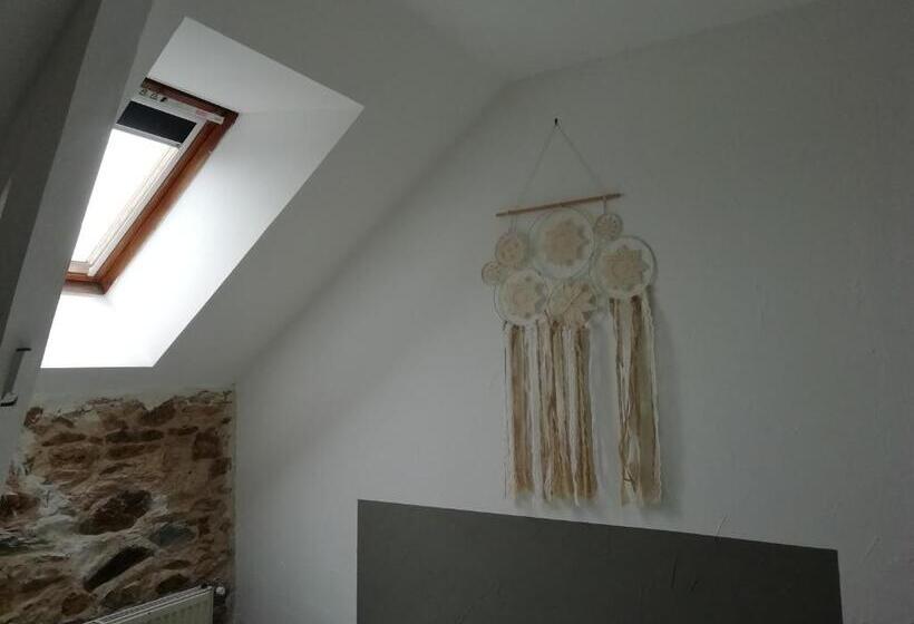 חדר לארבעה סטנדרטי עם נוף לגינה, Les Gîtes Du Petit Marcel