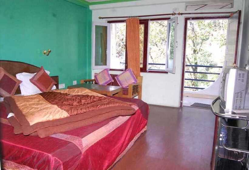 Номер Deluxe, Goroomgo Shivay Kausani