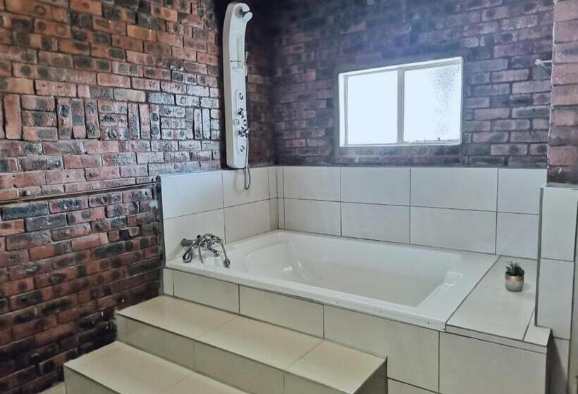 キングサイズベッドのデラックススイート, @anderson Executive Suites