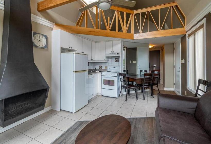 침실 1개 아파트, Condo Climatisé Près Du Mont Sainte Anne Avec Parc Aquatique, Piscine, Spa, Gym, Arcades Et Billard