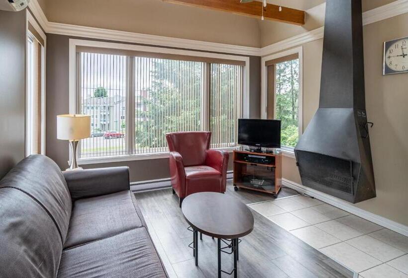 침실 1개 아파트, Condo Climatisé Près Du Mont Sainte Anne Avec Parc Aquatique, Piscine, Spa, Gym, Arcades Et Billard