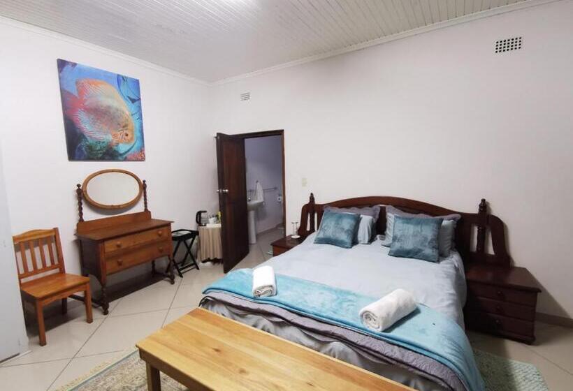 キングサイズベッドのデラックスルーム, Kameeldoring Guest House