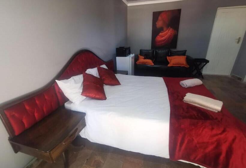 キングサイズベッドのデラックスルーム, Kameeldoring Guest House