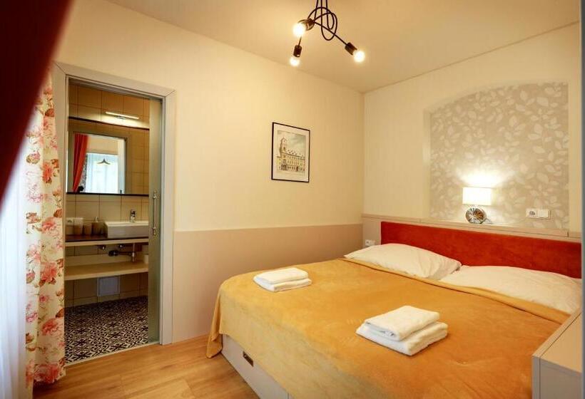 استودیوی لوکس, Apartmány Adam