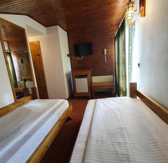 סוויטה משפחתית, Pensiunea Melinda