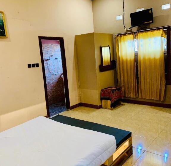 标准间, Santoso Batu