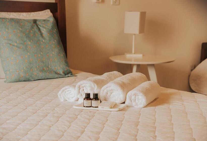 اتاق خانوادگی با چشم‌انداز باغ, Pousada Cheiro Da Terra