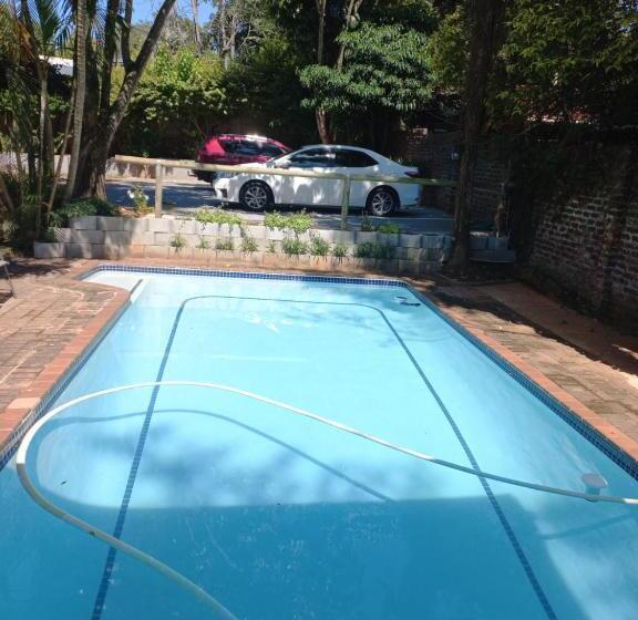 디럭스 스위트 킹 침대, Kruger S Guest House