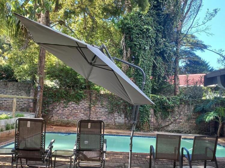 디럭스 스위트 킹 침대, Kruger S Guest House