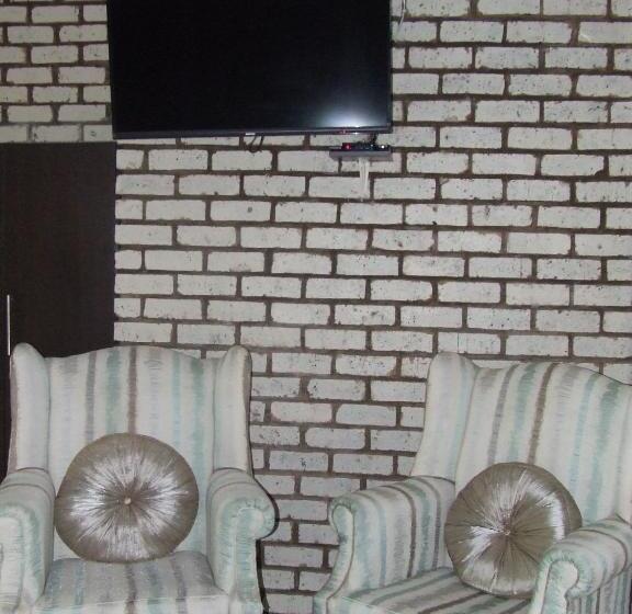 キングサイズベッドのデラックススイート, Kruger S Guest House