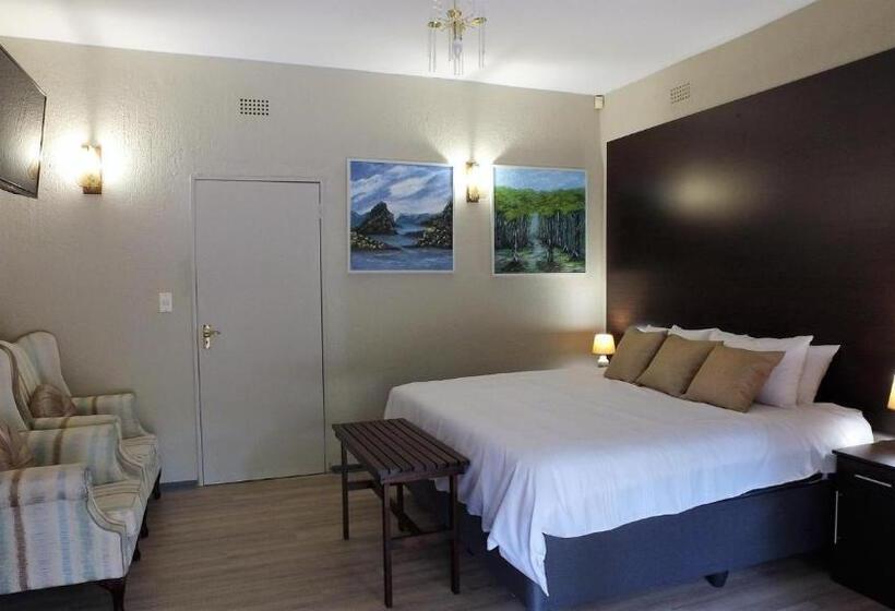 디럭스 스위트 킹 침대, Kruger S Guest House