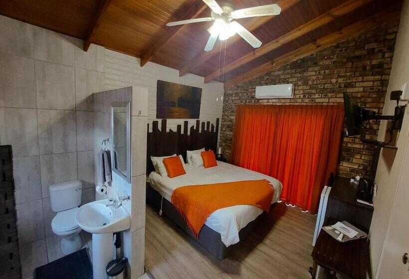 디럭스 스위트 킹 침대, Kruger S Guest House
