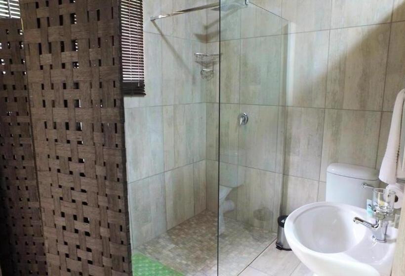 キングサイズベッドのデラックススイート, Kruger S Guest House