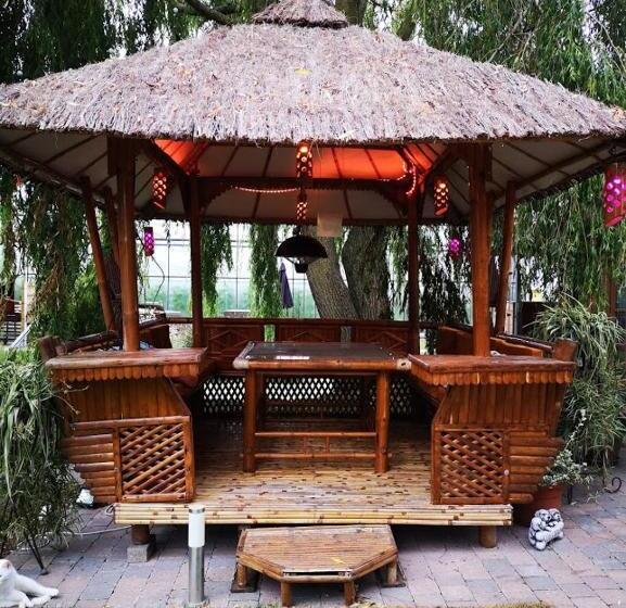 스위트 킹사이즈 침대, Het Filipijns Slaaphuisje