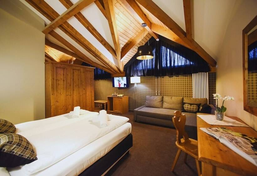 غرفة قياسية رباعية, Orso Grigio