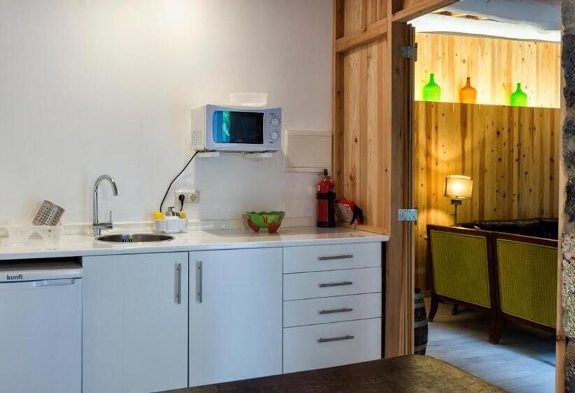 سوئیت جونیور با چشمانداز باغ, Casa Do Populo