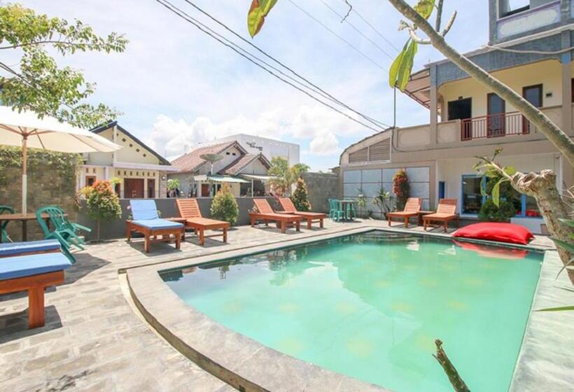 סוויטה אקזקיוטיב, Ridho Malik