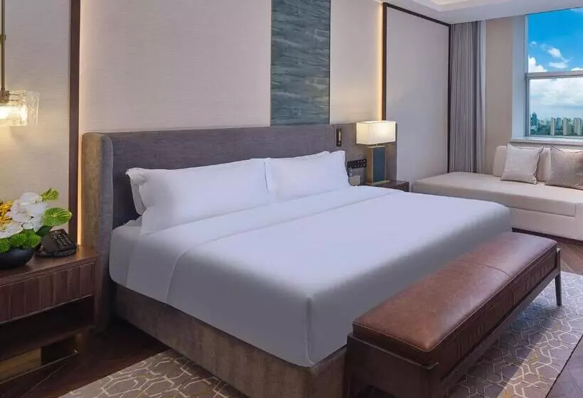 キングサイズベッドのデラックスルーム, Jin Jiang International Hotel Taicang