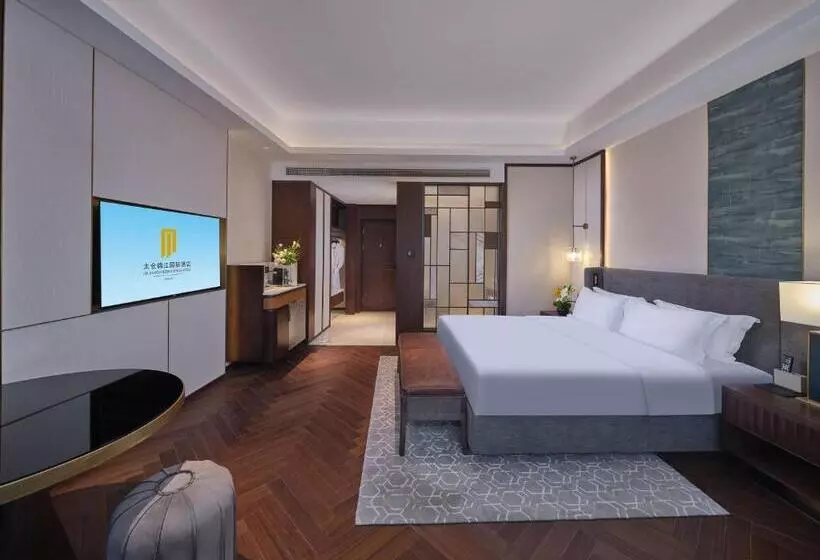 キングサイズベッドのデラックスルーム, Jin Jiang International Hotel Taicang