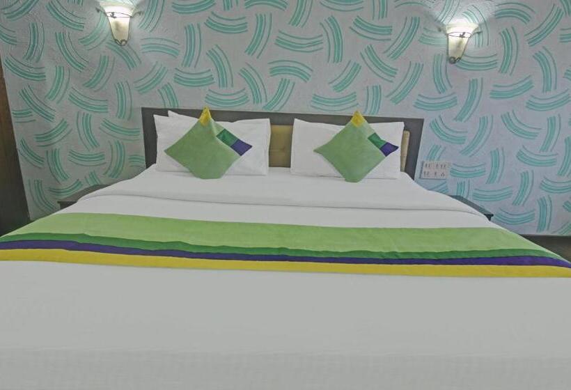 Quarto Deluxe, Treebo Savoury Sea Shell Residency