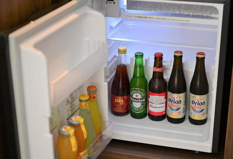 מיטת קינג בסוויטה, Ryukyu Hotel & Resort Nashiro Beach