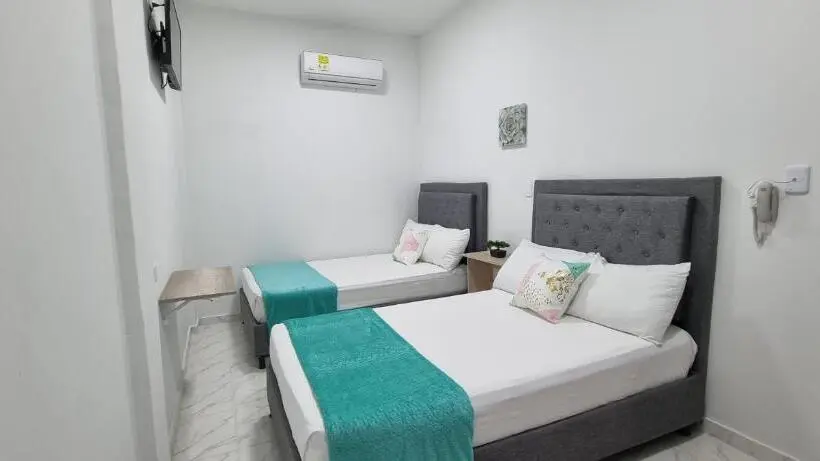 Economy Quadruple Room, Garden Home Hostal