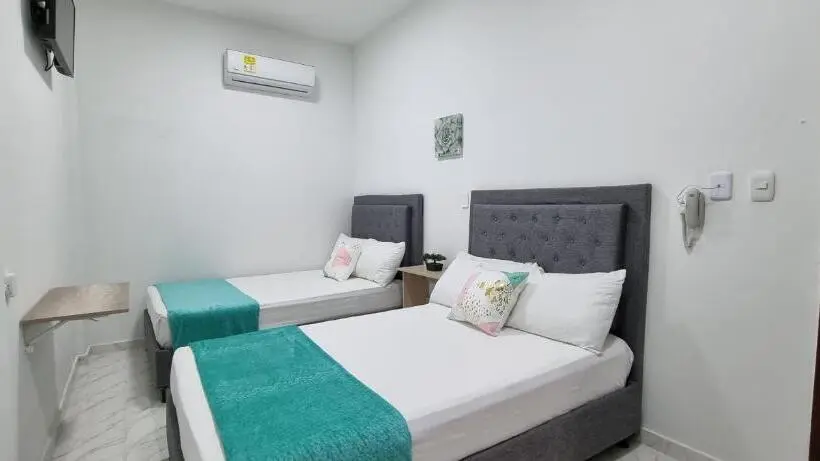 Economy Quadruple Room, Garden Home Hostal