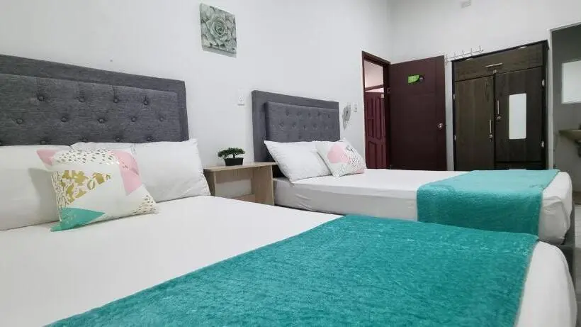 Economy Quadruple Room, Garden Home Hostal