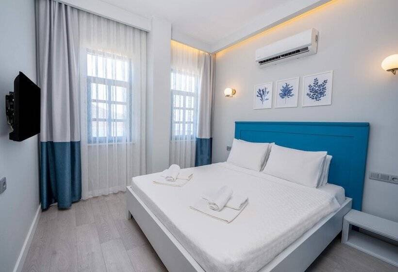 غرفة عائلية, Kas Marin