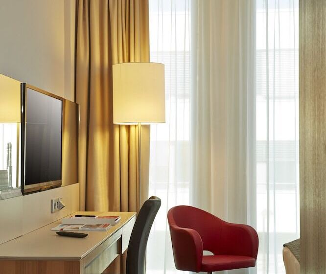 Номер Deluxe, H4 Hotel München Messe