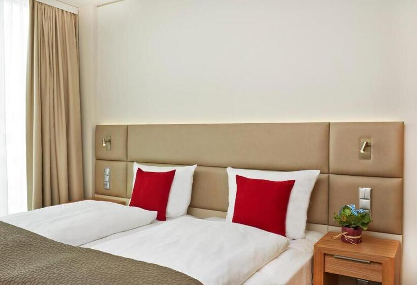Номер Deluxe, H4 Hotel München Messe