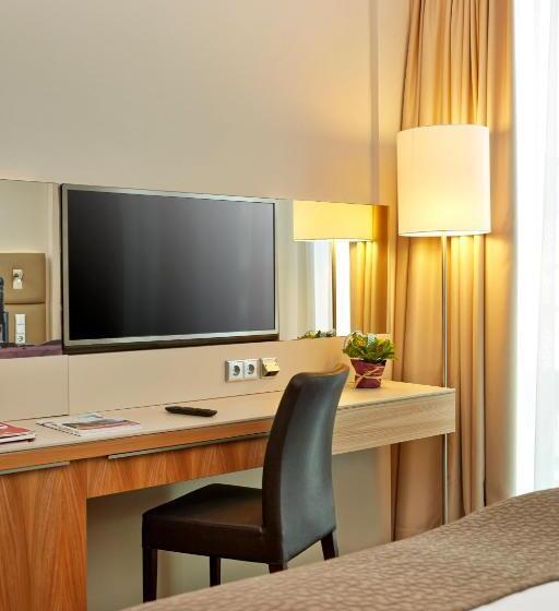 Номер Deluxe, H4 Hotel München Messe