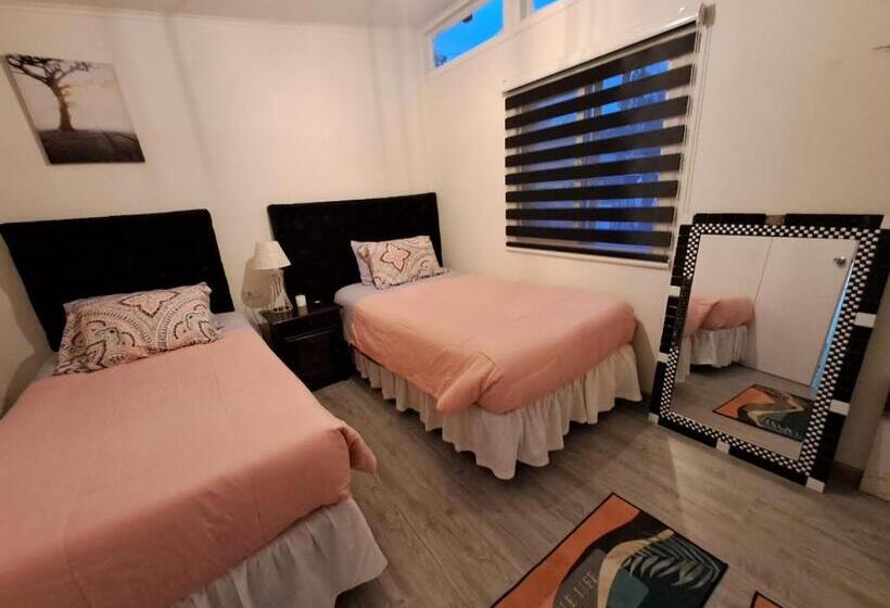 חדר סטנדרט לשלושה עם נוף לגינה, Hostal El Aromo Pensión A Empresas