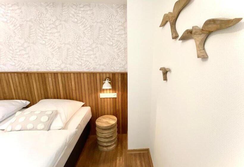 غرفة كومفورت, Deutsches Haus