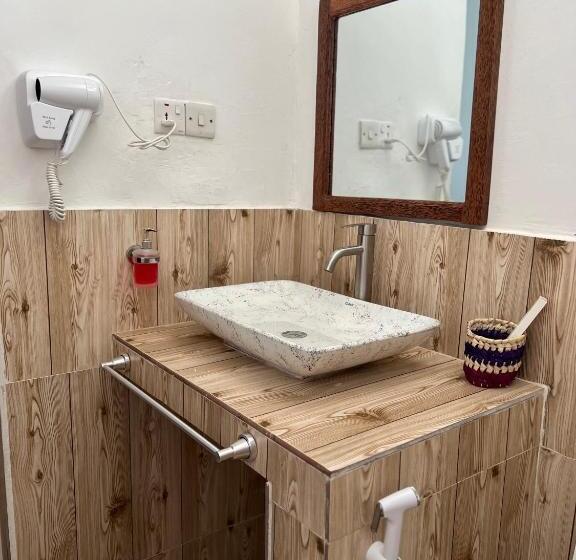 اتاق راحتی سه تخته, Nungwi Beach Front