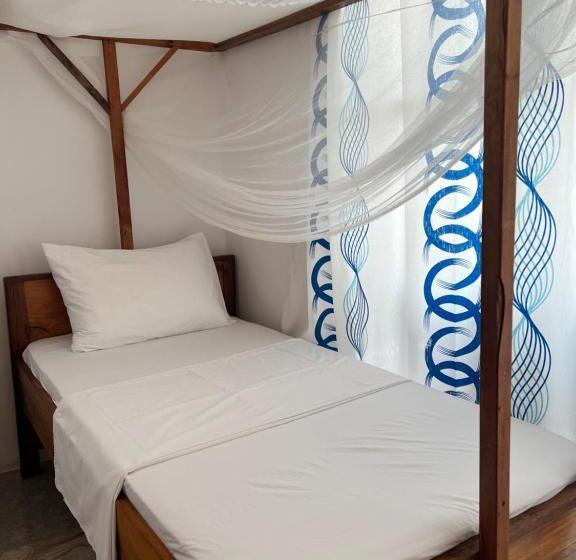 اتاق راحتی سه تخته, Nungwi Beach Front